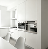 Glossy White Handleless Kitchen Cabinet With Island
